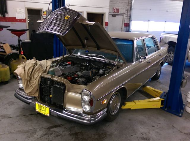 Classic Mercedes sedan on the lift